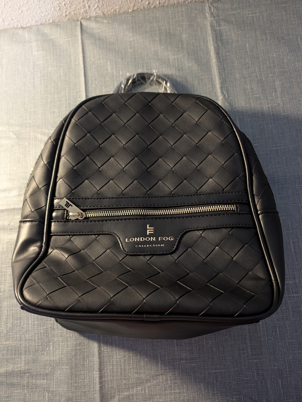 London Fog Black Quilted Backpack with Front Zip and Logo